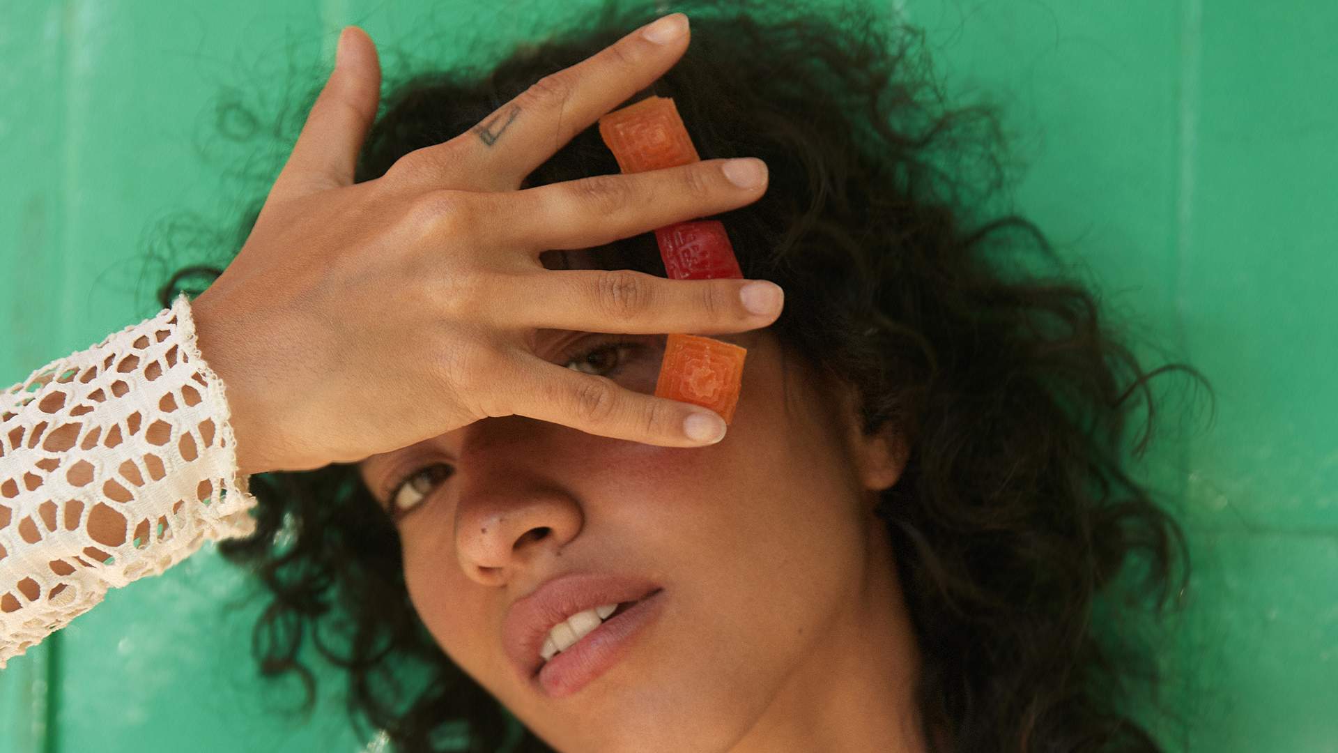 woman eating gomitas